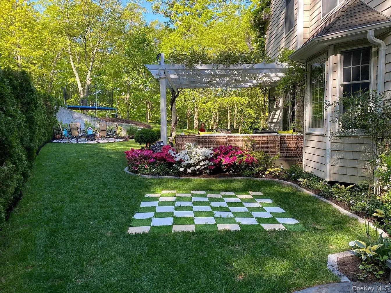 Unique garden with chess game on the lawn Unique garden with chess game on the lawn