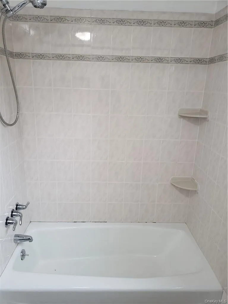 Full bath with shower / bath combination Full bath with shower / bath combination