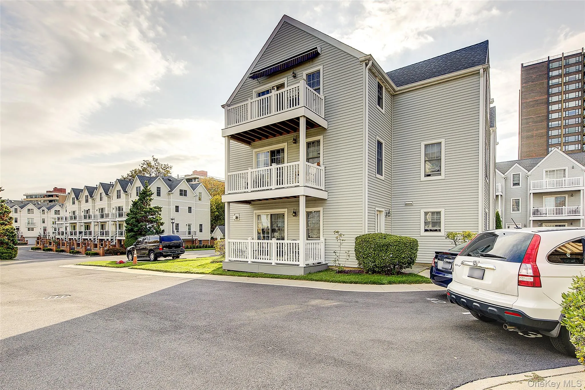 View of building exterior featuring a residential view View of building exterior featuring a residential view