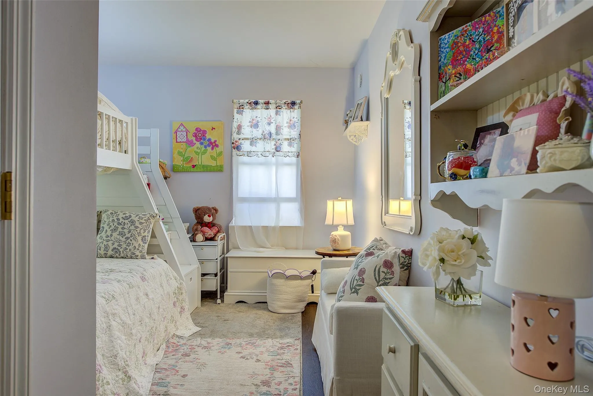 Bedroom featuring light colored carpet Bedroom featuring light colored carpet