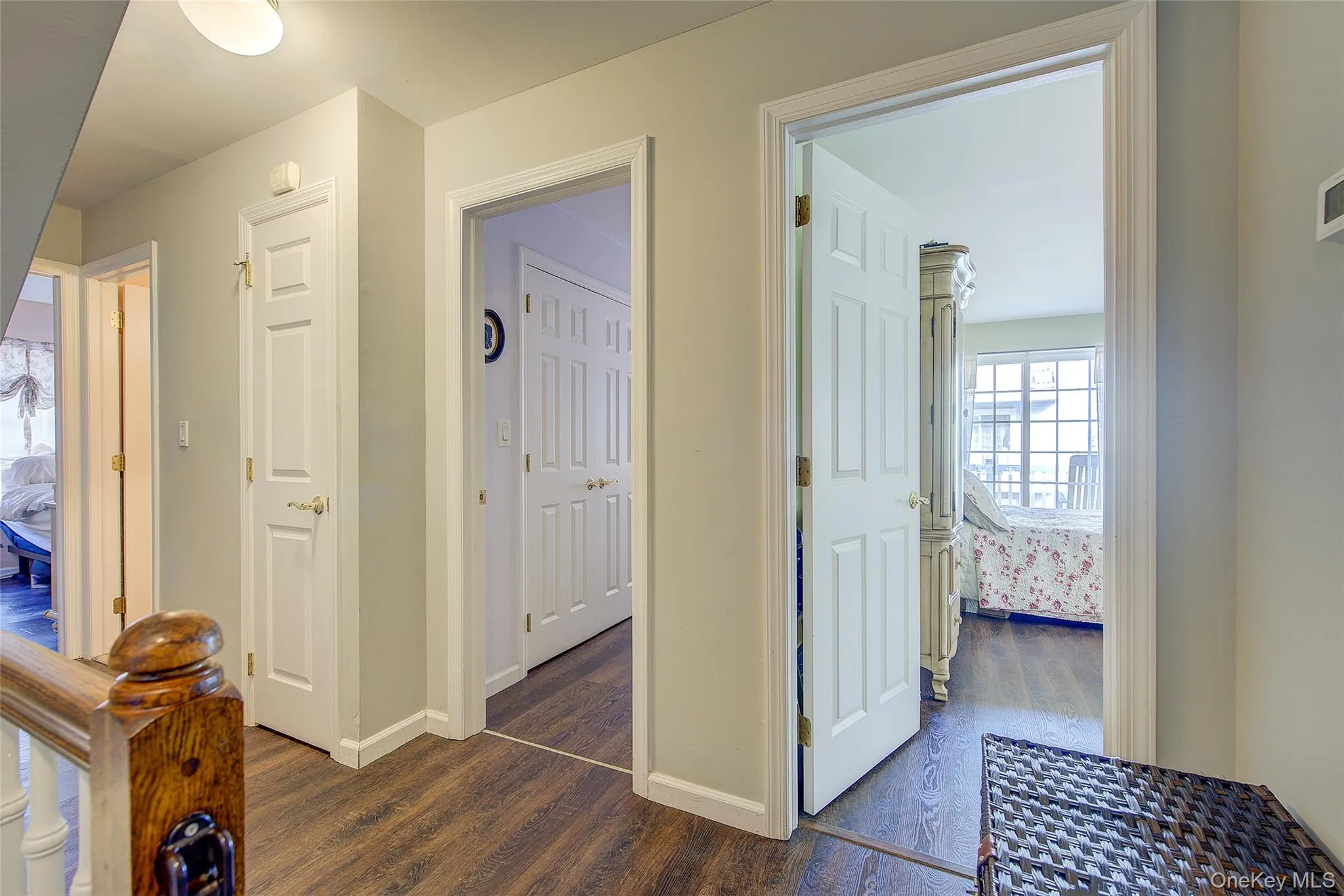 Hall with dark wood-style flooring Hall with dark wood-style flooring
