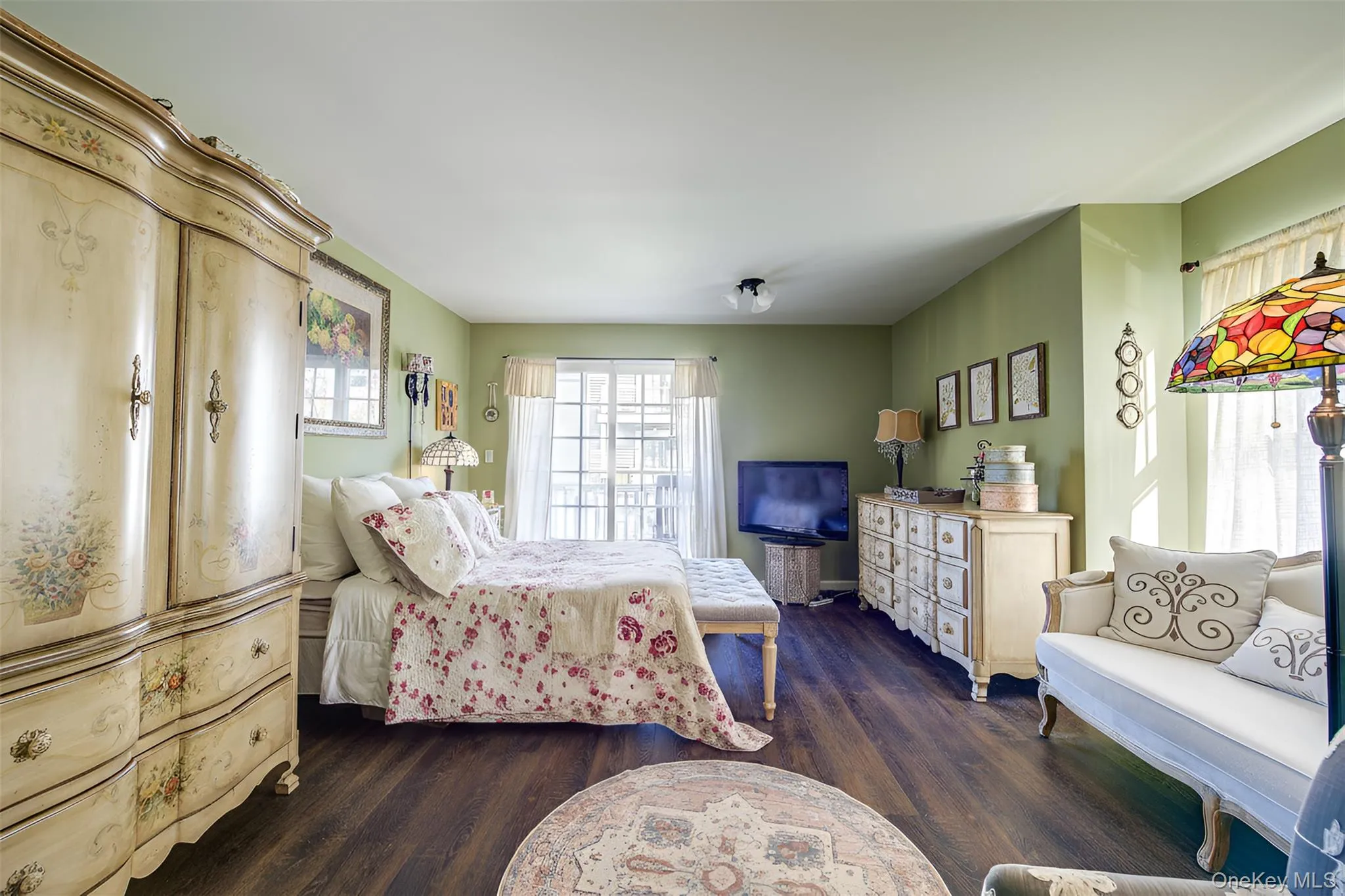 Bedroom featuring dark wood-type flooring Bedroom featuring dark wood-type flooring