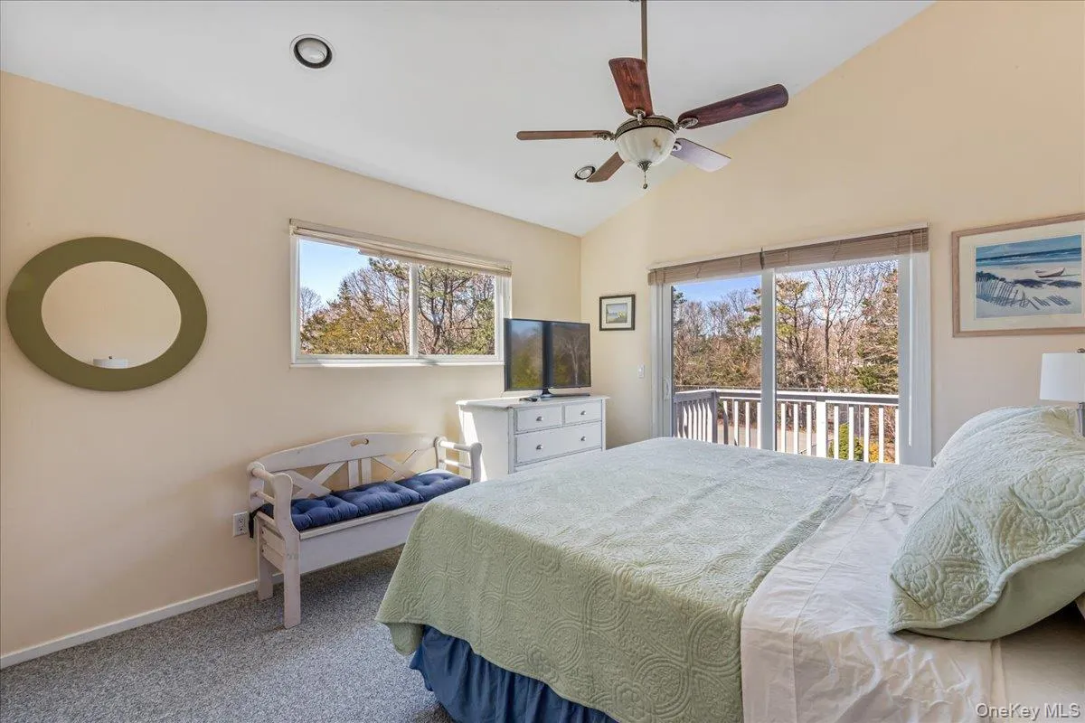 2nd floor primary en suite with balcony overlooking rear yard 2nd floor primary en suite with balcony overlooking rear yard
