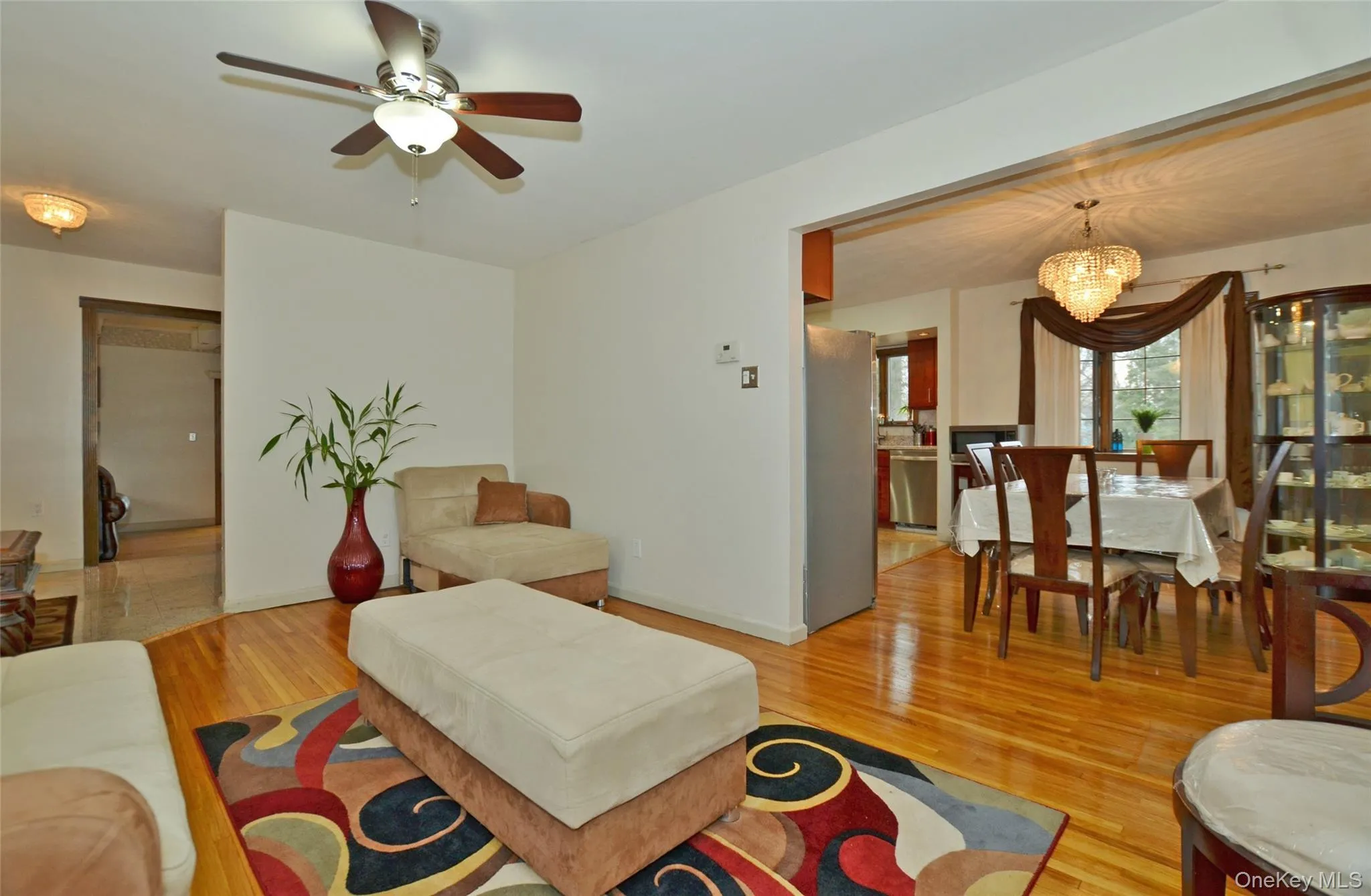 Livingroom open to dining room. Beautiful hw floors throughout the home. No carpeting! Livingroom open to dining room. Beautiful hw floors throughout the home. No carpeting!