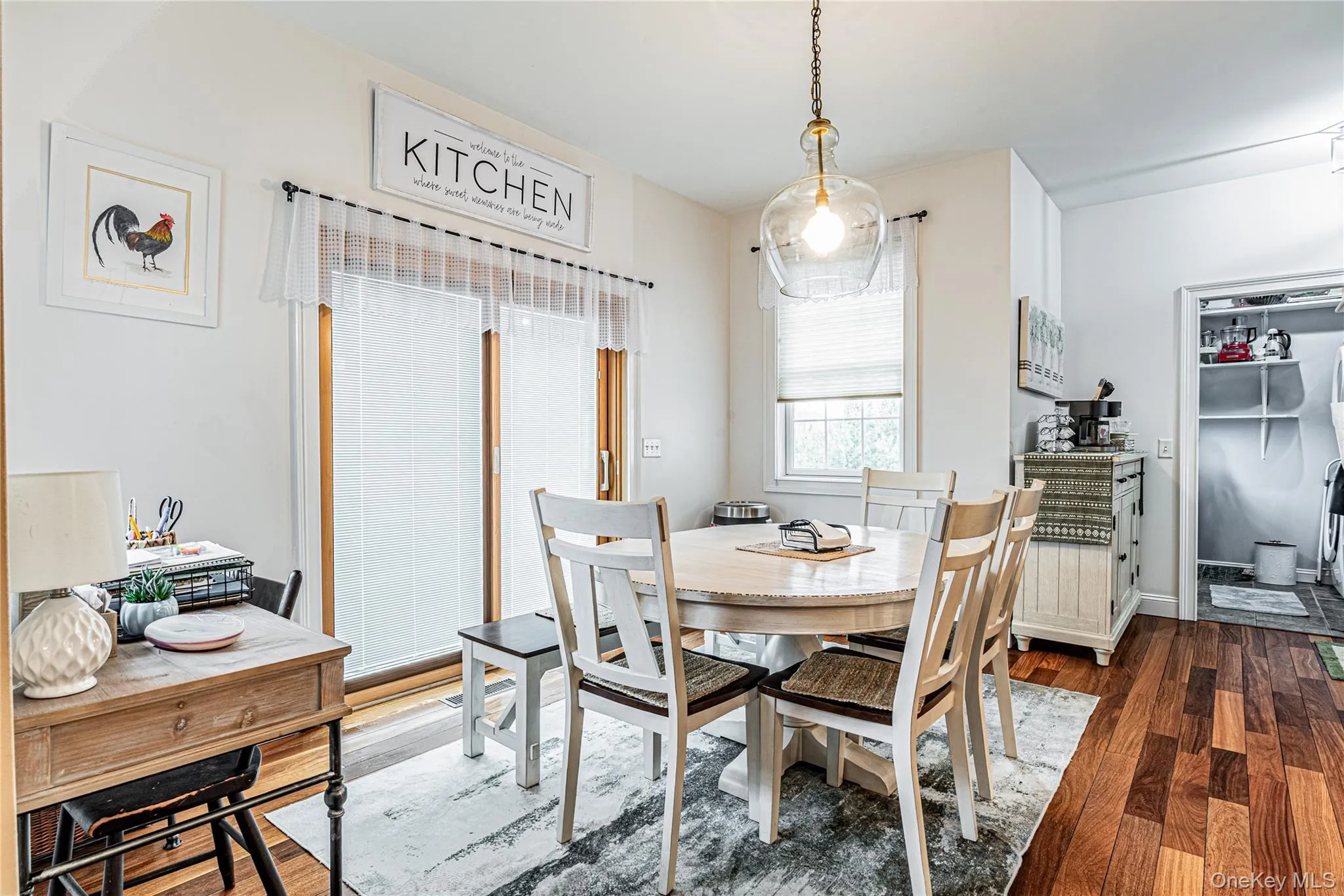 Eat in kitchen area with wood finished floors Eat in kitchen area with wood finished floors