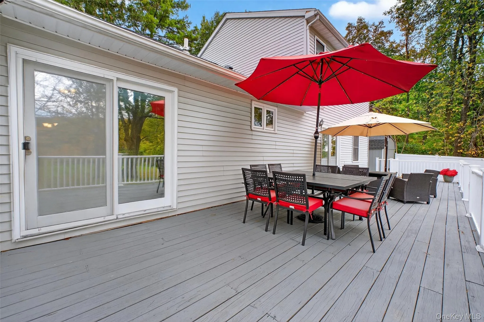 Wooden deck with outdoor dining area Wooden deck with outdoor dining area