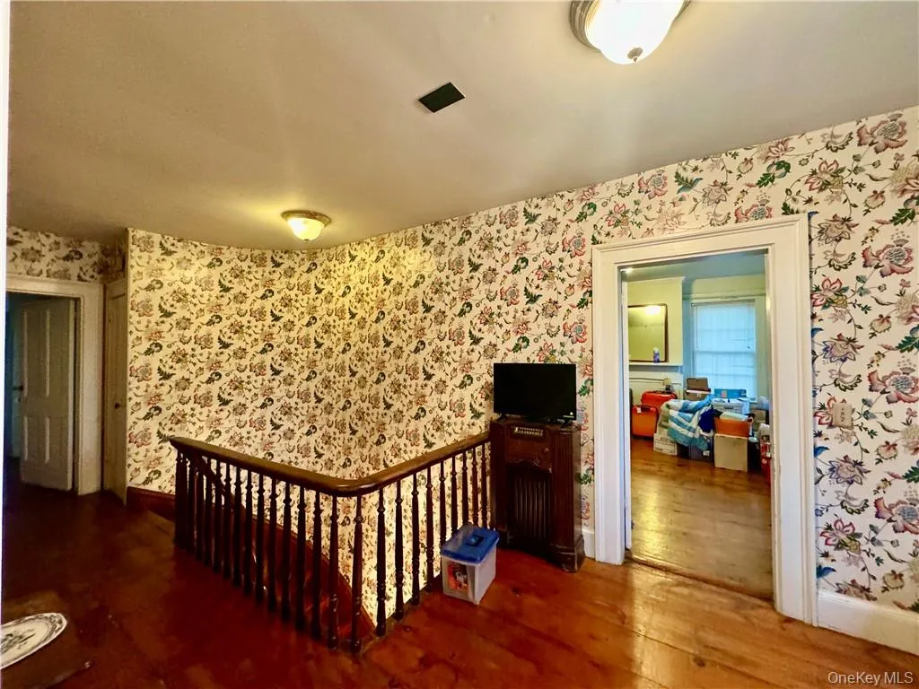 2nd floor Hall with hardwood / wood-style flooring 2nd floor Hall with hardwood / wood-style flooring