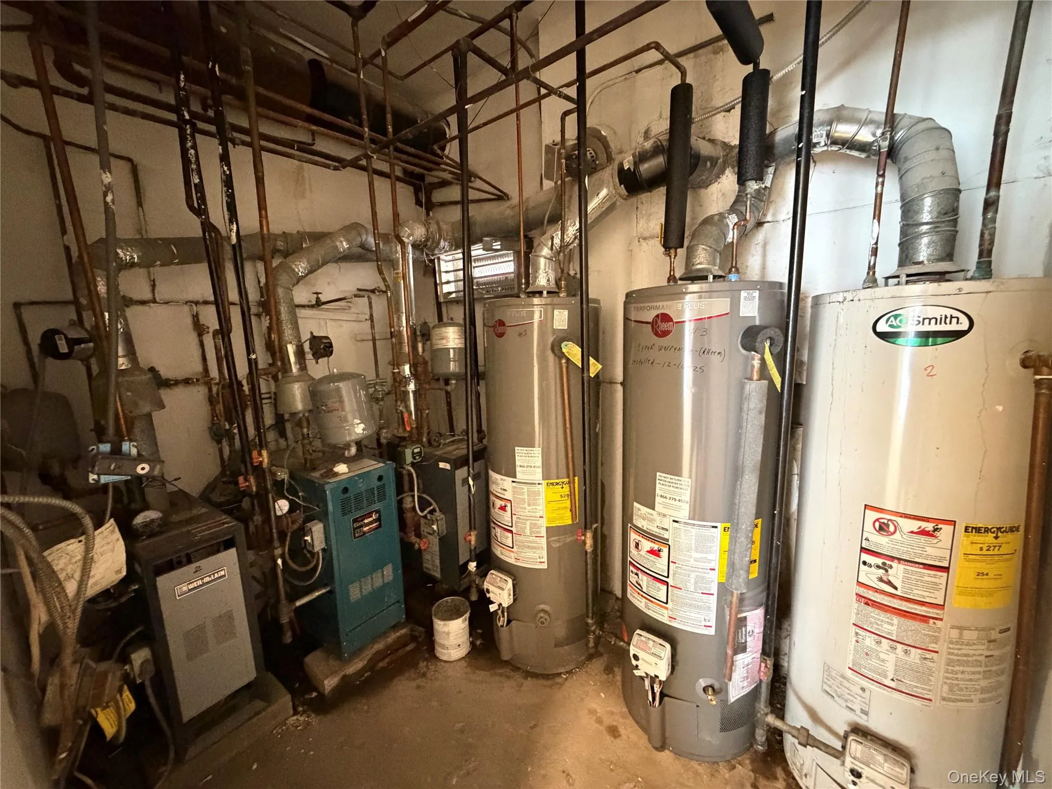 Utilities featuring gas water heater and a heating unit Utilities featuring gas water heater and a heating unit