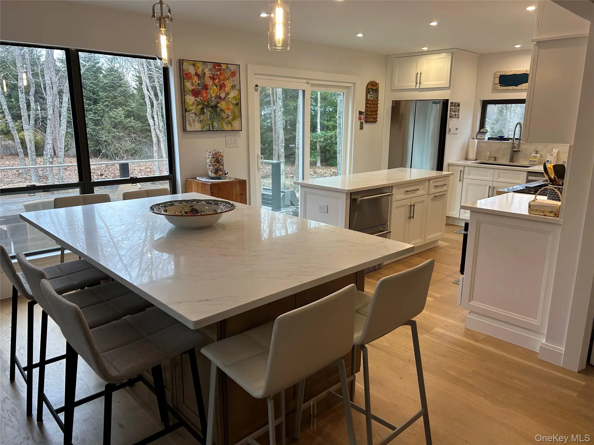 Dining room featuring recessed lighting and light wood-type flooring Dining room featuring recessed lighting and light wood-type flooring