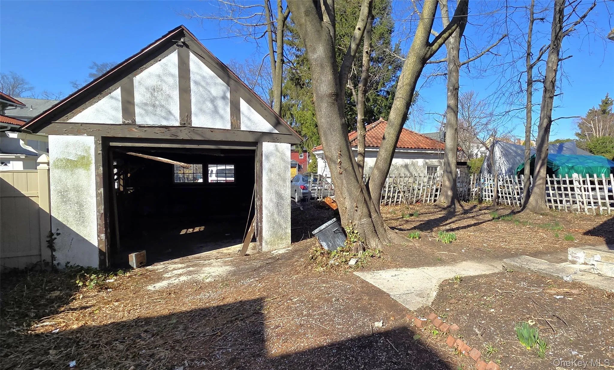 One-Car Garage and Back Yard One-Car Garage and Back Yard
