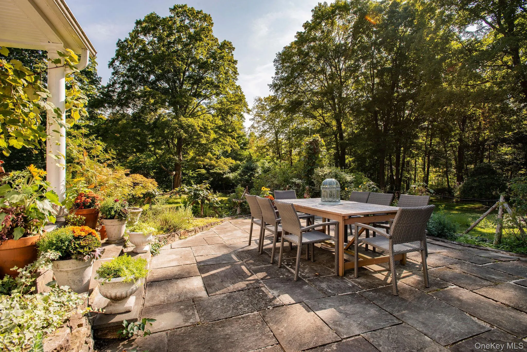 View of patio / terrace featuring outdoor dining space View of patio / terrace featuring outdoor dining space