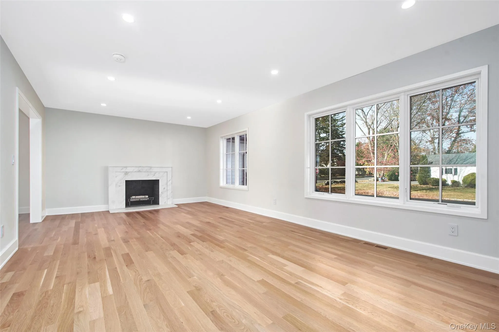 Formal living room with fireplace. Formal living room with fireplace.
