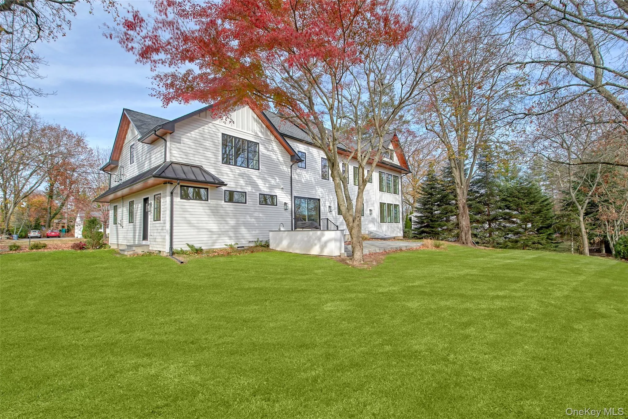 Back of property with a yard Back of property with a yard