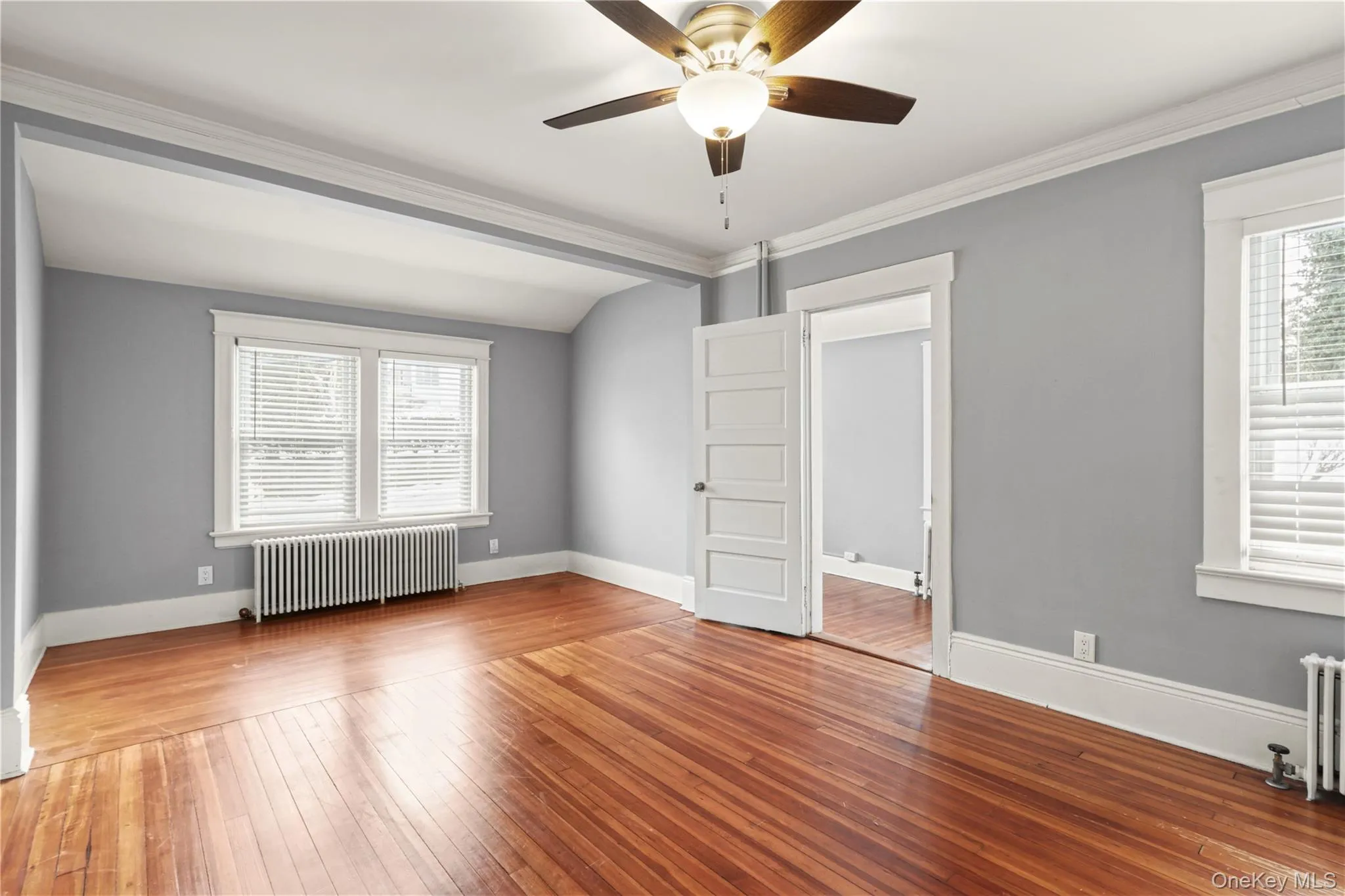 Bright living Room with Beautiful Hardwood FloorsShowing Door to Den/Office-Can be 2nd Bedroom Bright living Room with Beautiful Hardwood FloorsShowing Door to Den/Office-Can be 2nd Bedroom