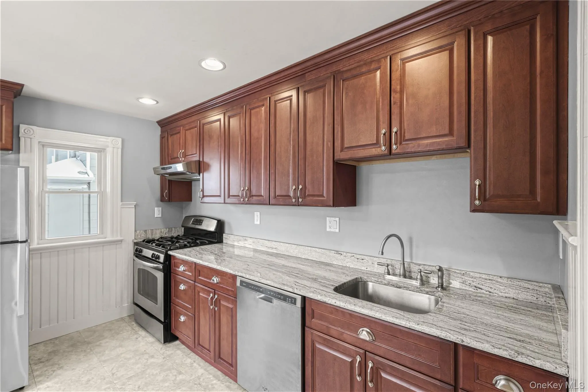 Kitchen with Granite Counters, Gas Stove and Dishwasher Kitchen with Granite Counters, Gas Stove and Dishwasher