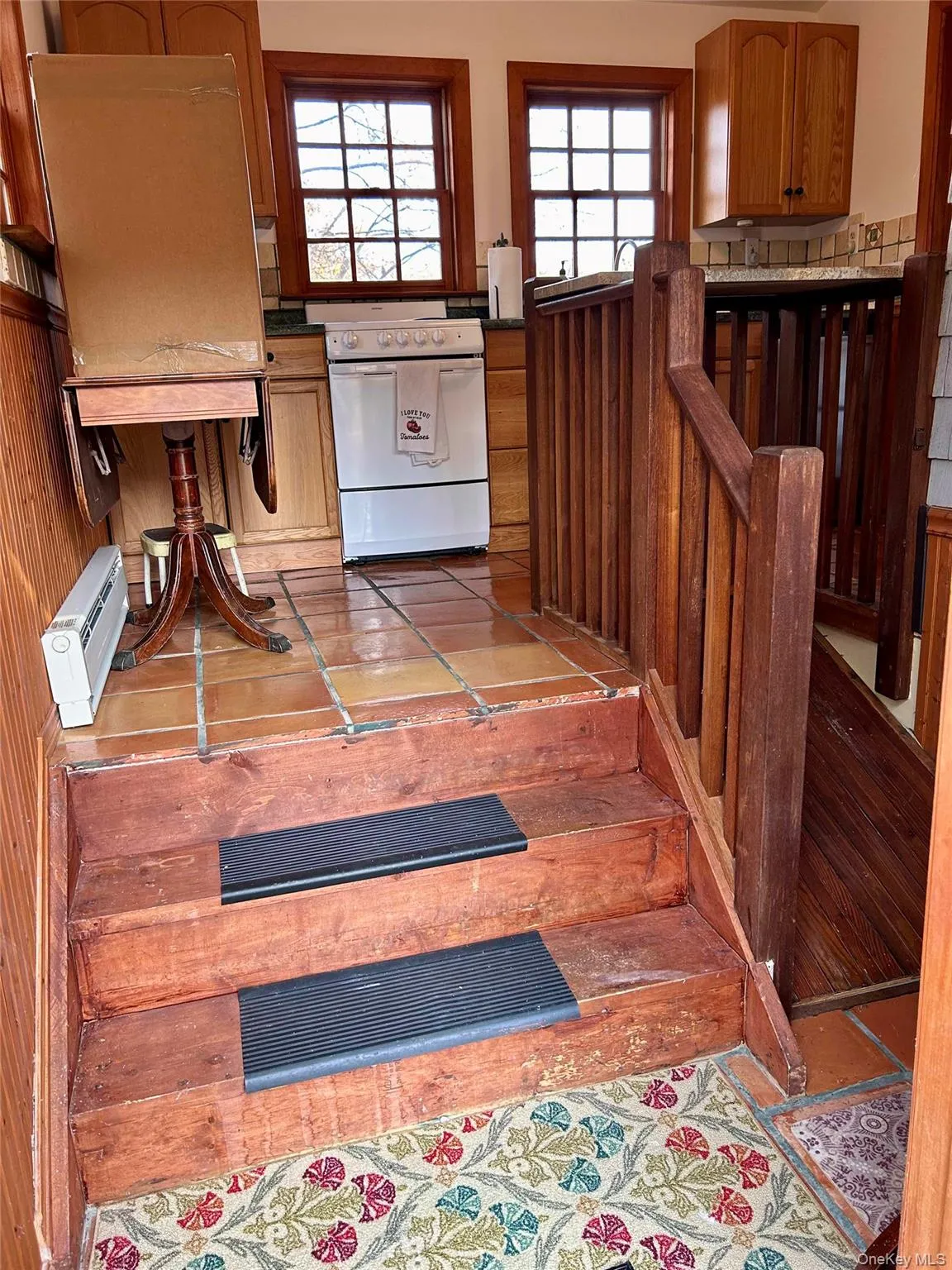 View of stairway from Kitchen entrance View of stairway from Kitchen entrance