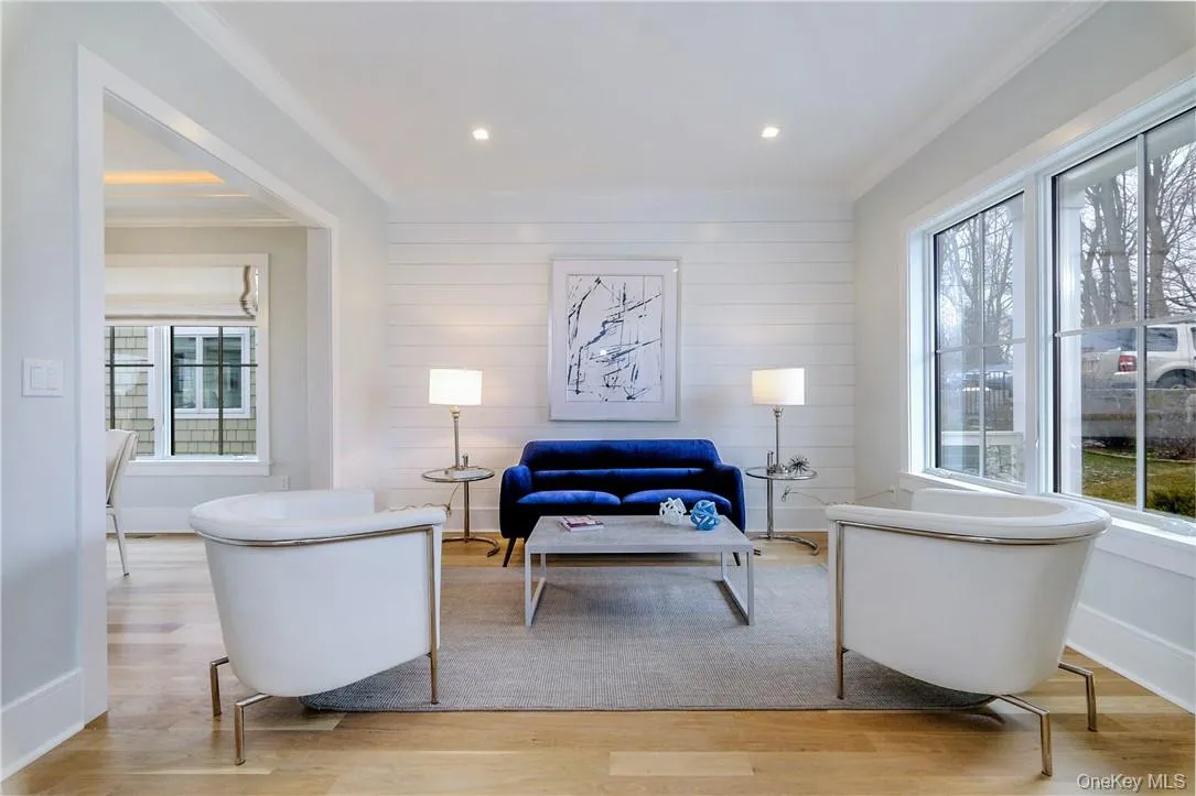 Elegant living room w/ shiplap wall Elegant living room w/ shiplap wall