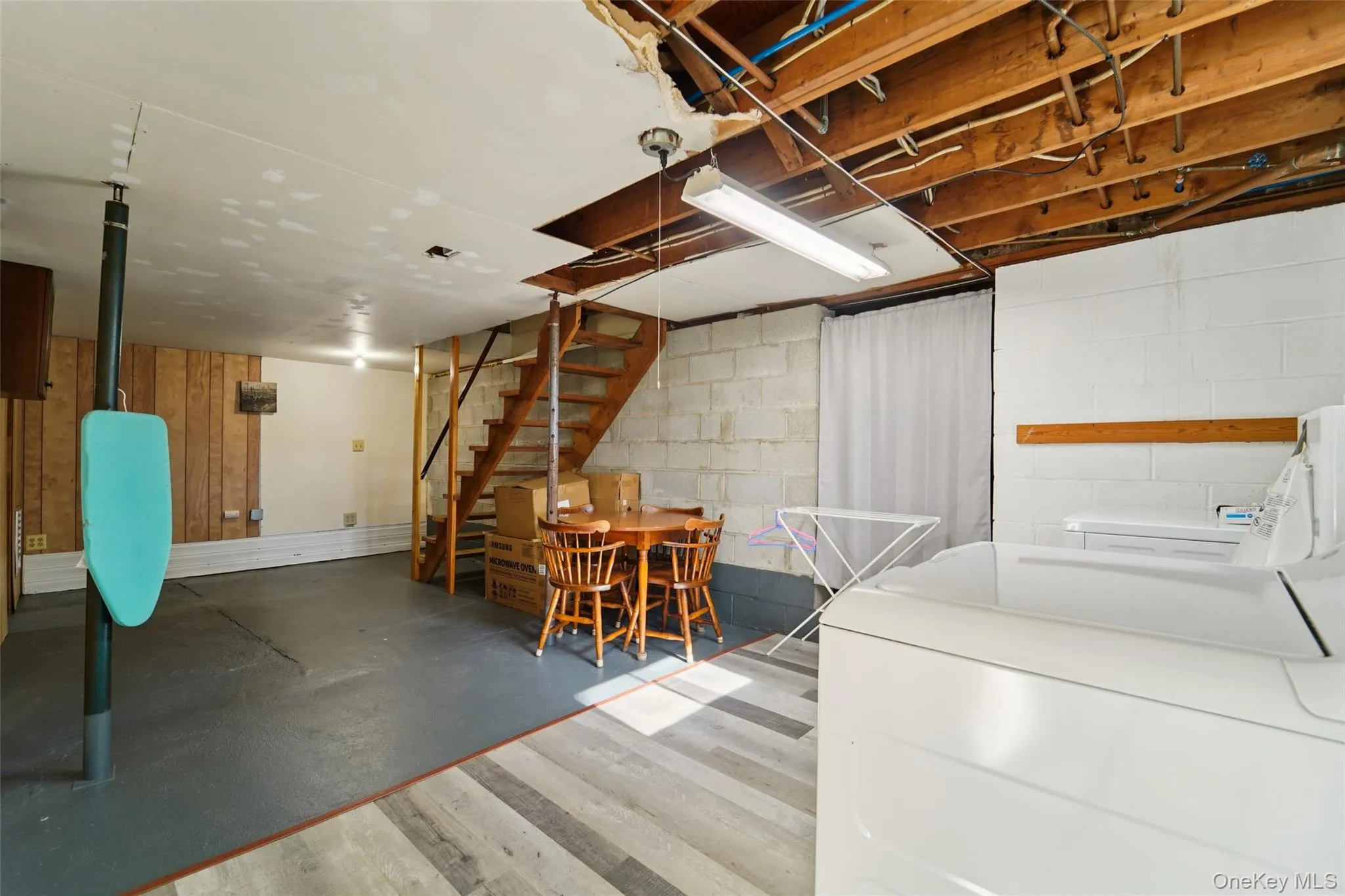 Laundry space in basement. Laundry space in basement.