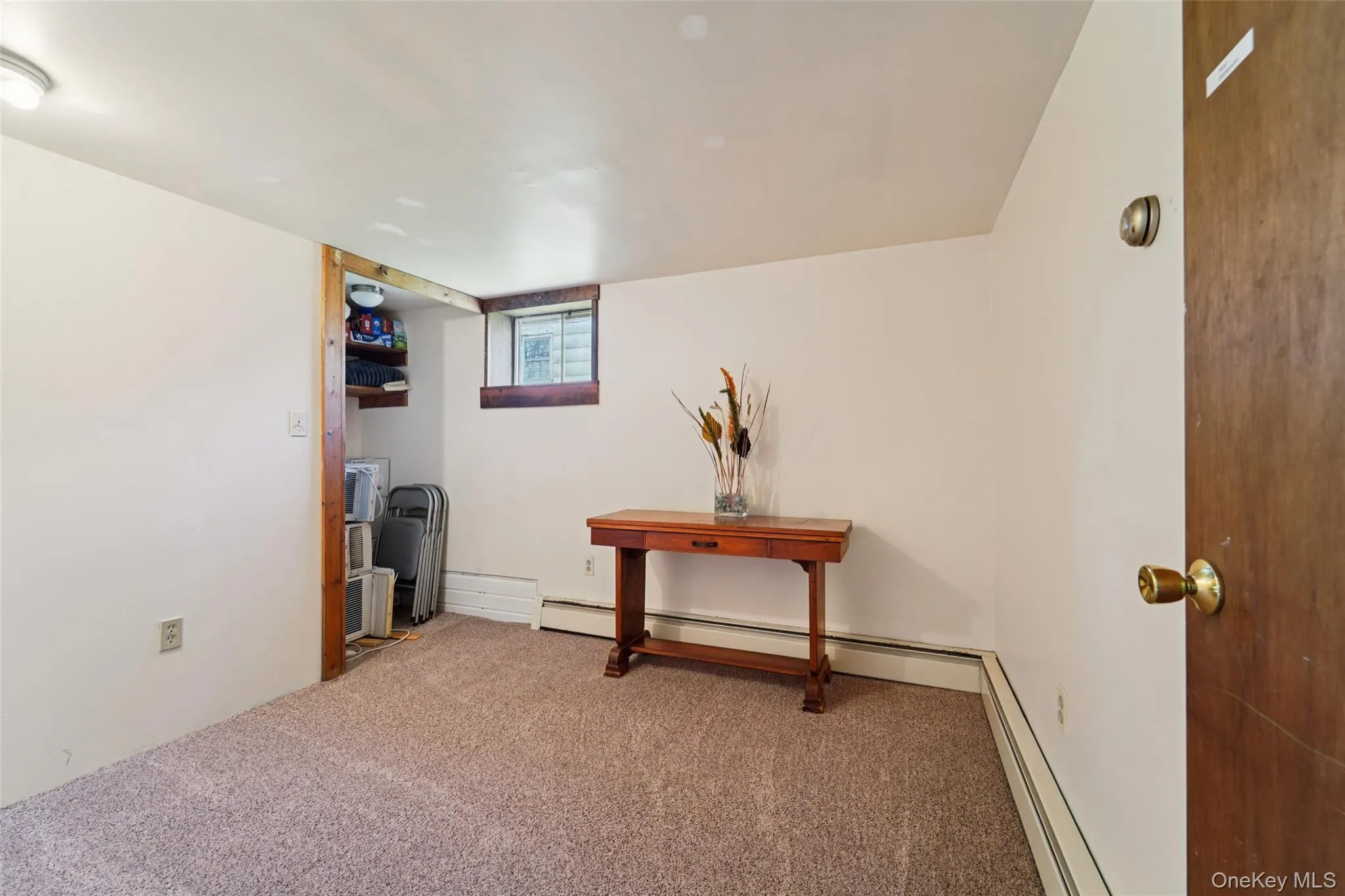 Finished bonus room in basement. Finished bonus room in basement.