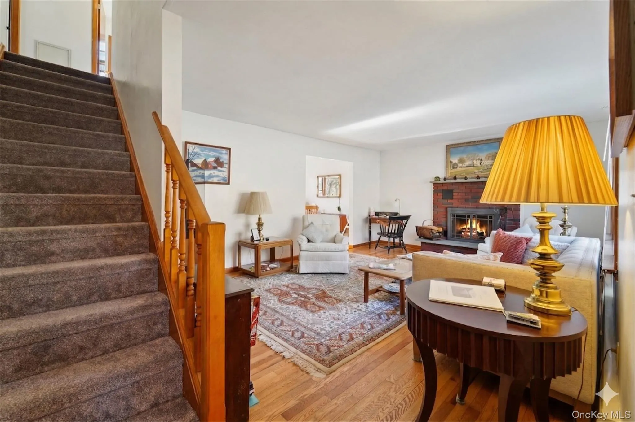 Living room with wood-burning fireplace. Living room with wood-burning fireplace.