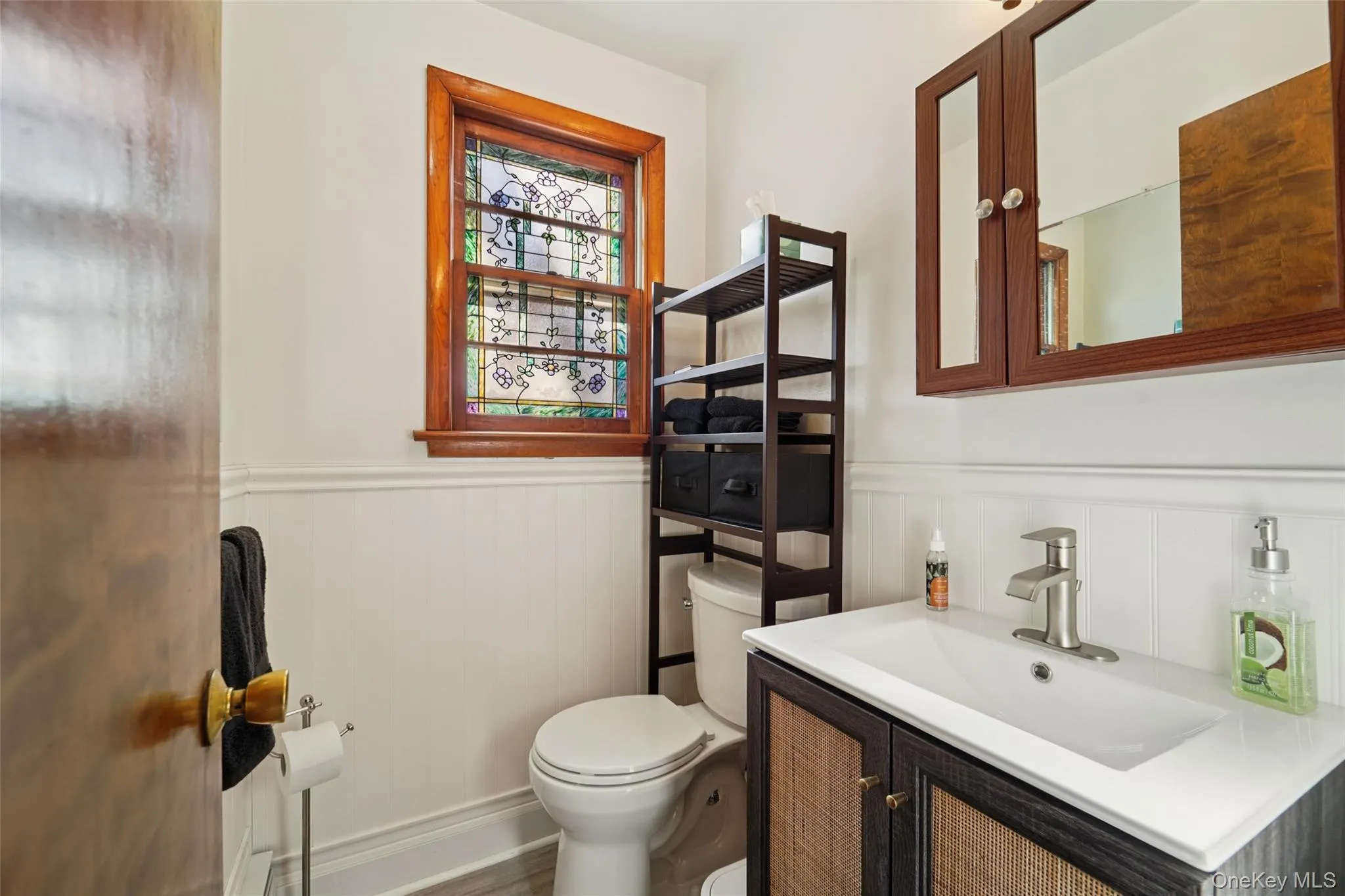 First floor half bathroom. First floor half bathroom.