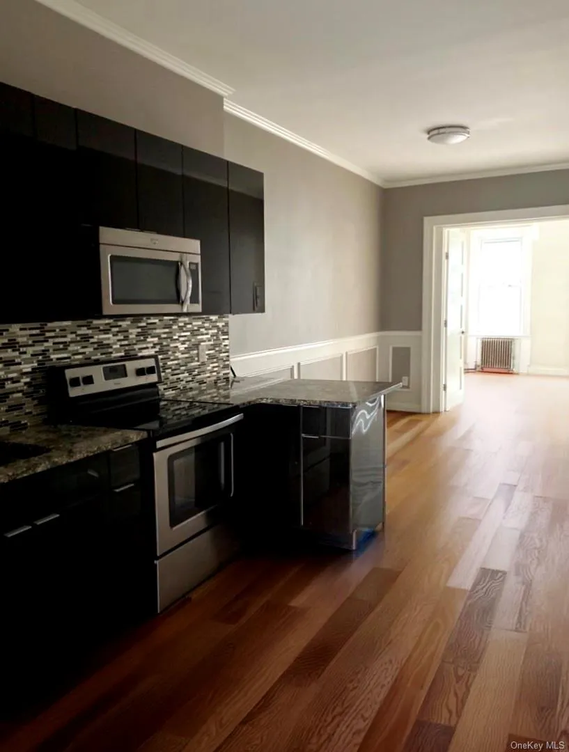Kitchen to living room space Kitchen to living room space
