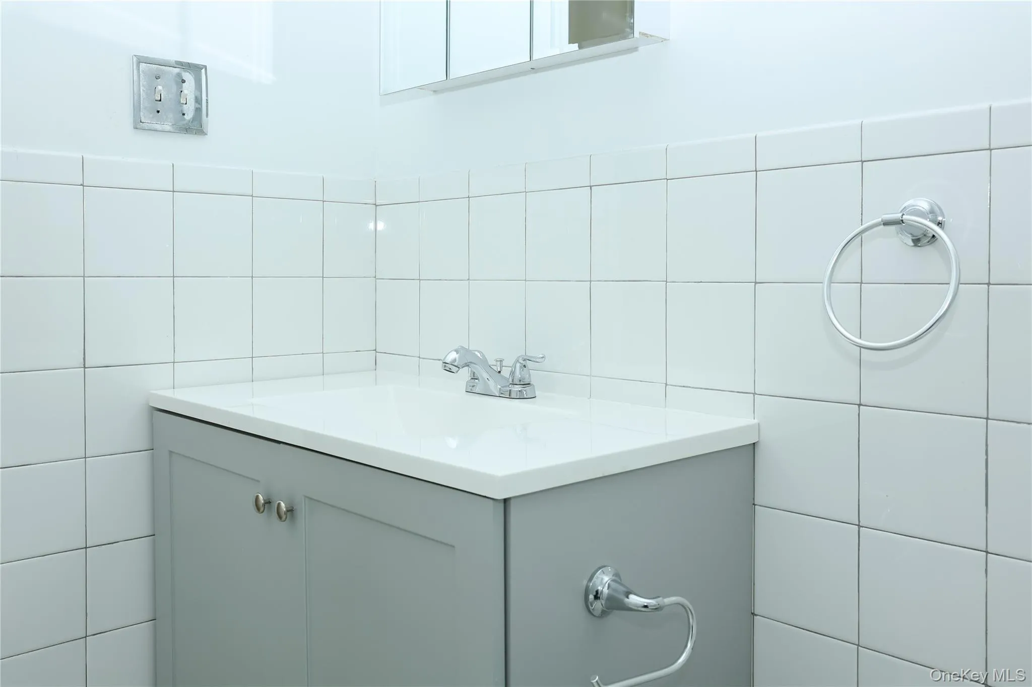 Bathroom featuring vanity Bathroom featuring vanity