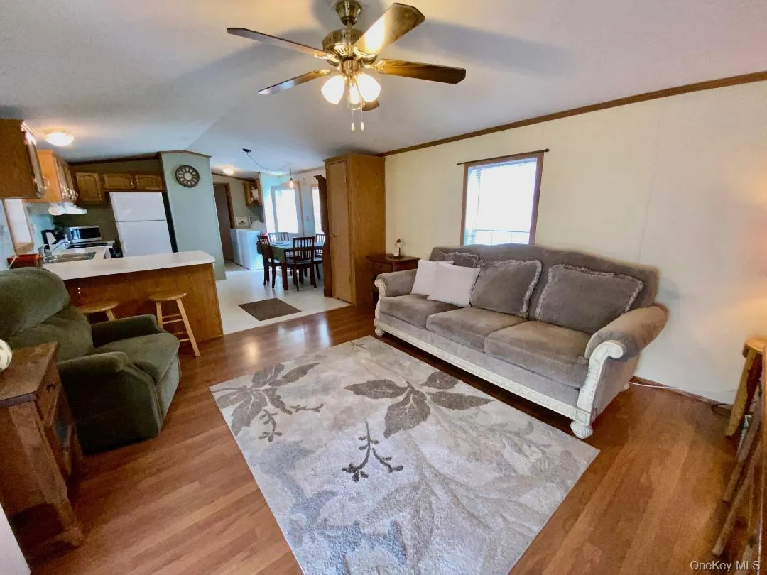 You're going to love the bright and airy open floor plan - where the living room opens to the kitchen and dining area. You're going to love the bright and airy open floor plan - where the living room opens to the kitchen and dining area.