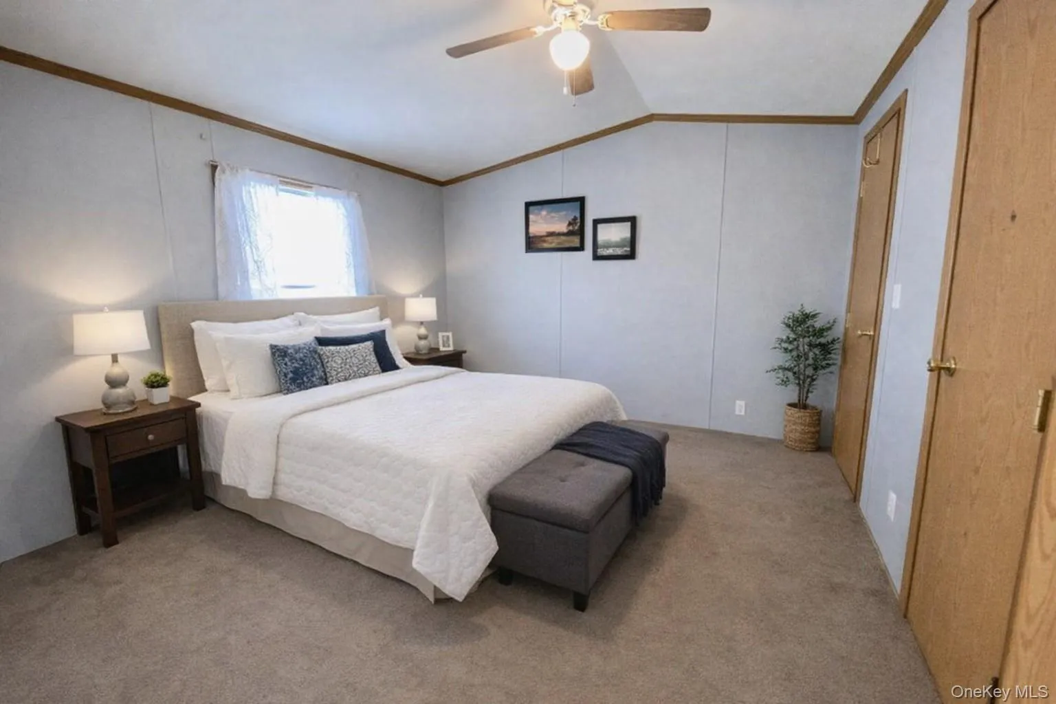 There's a spacious 2nd bedroom with a vaulted ceiling, 2 closets and a ceiling light fan. (Virtually staged) There's a spacious 2nd bedroom with a vaulted ceiling, 2 closets and a ceiling light fan. (Virtually staged)