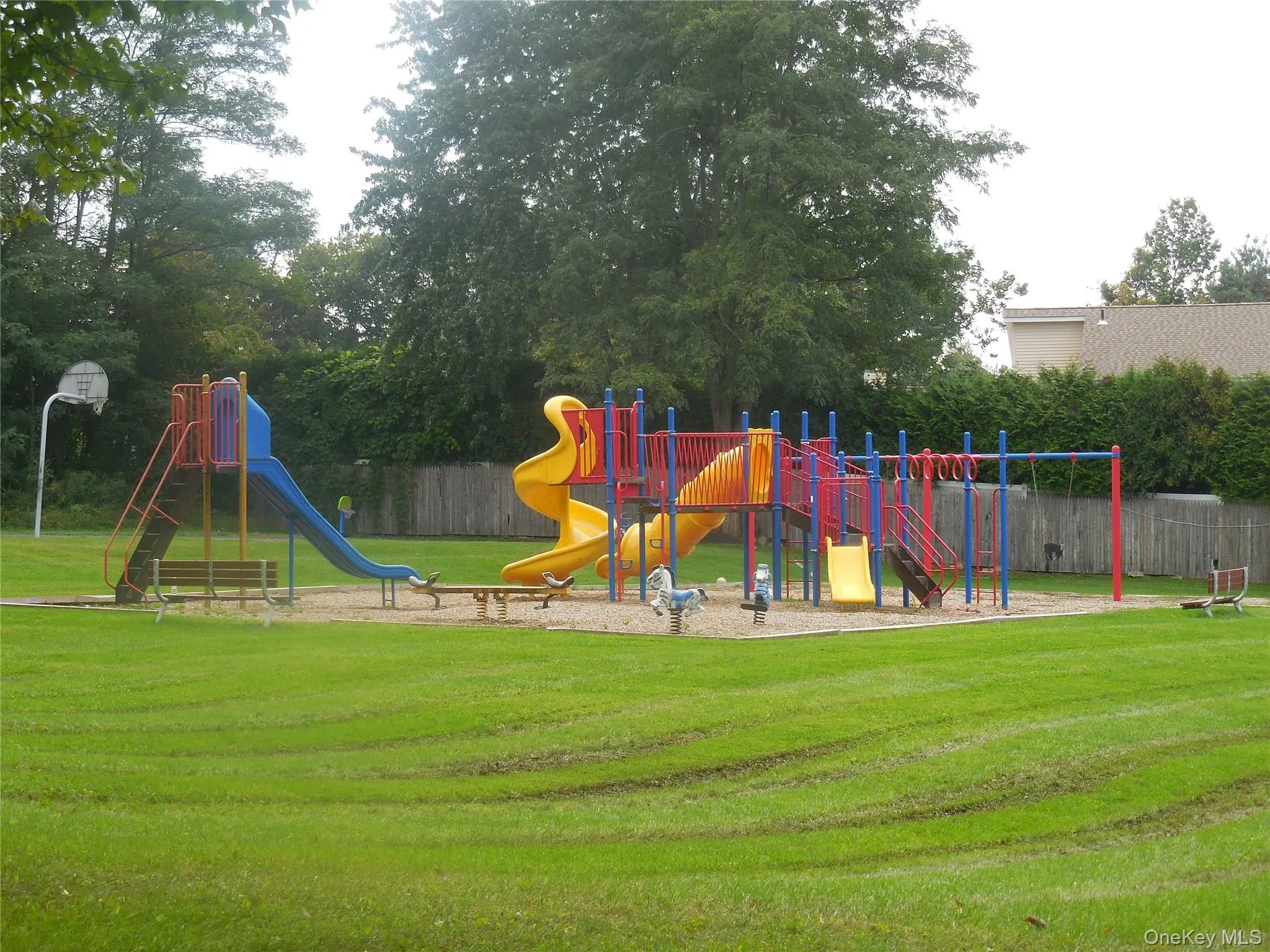 View of playground featuring a lawn... View of playground featuring a lawn...