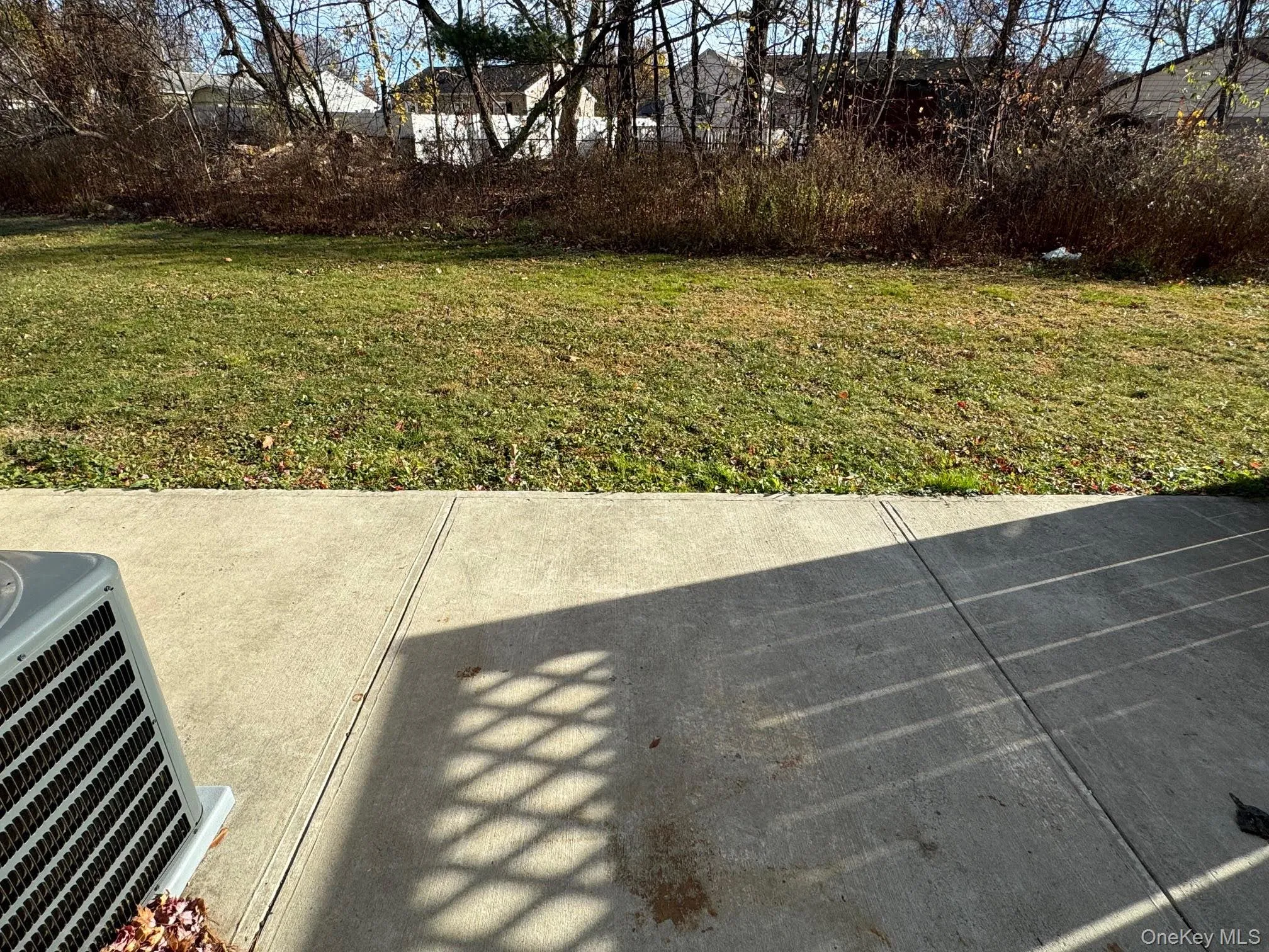 View of yard from the patio. View of yard from the patio.