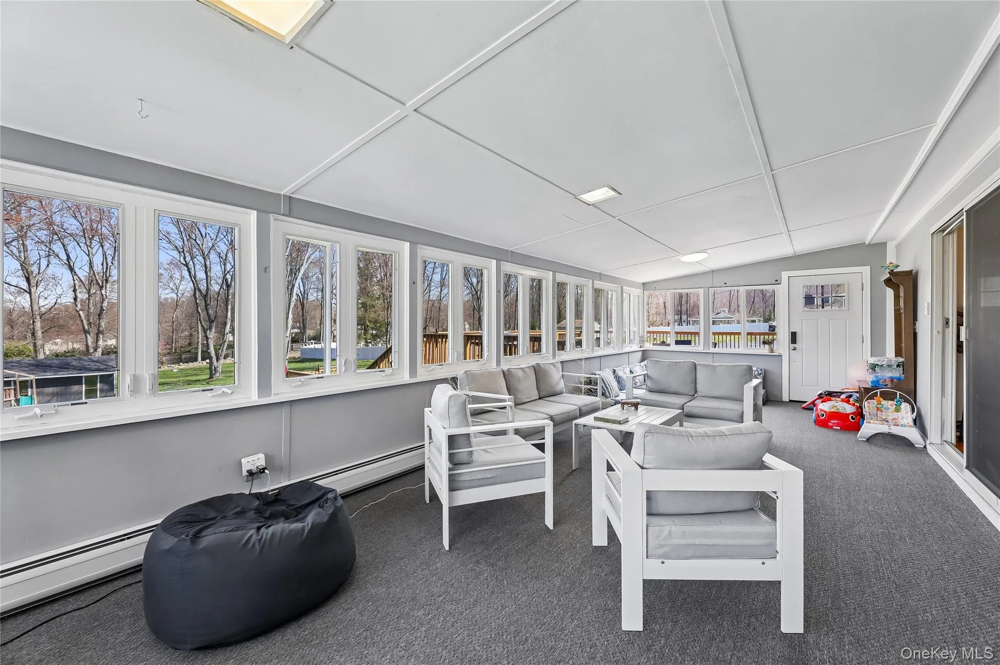 Enclosed sunroom featuring. Enclosed sunroom featuring.