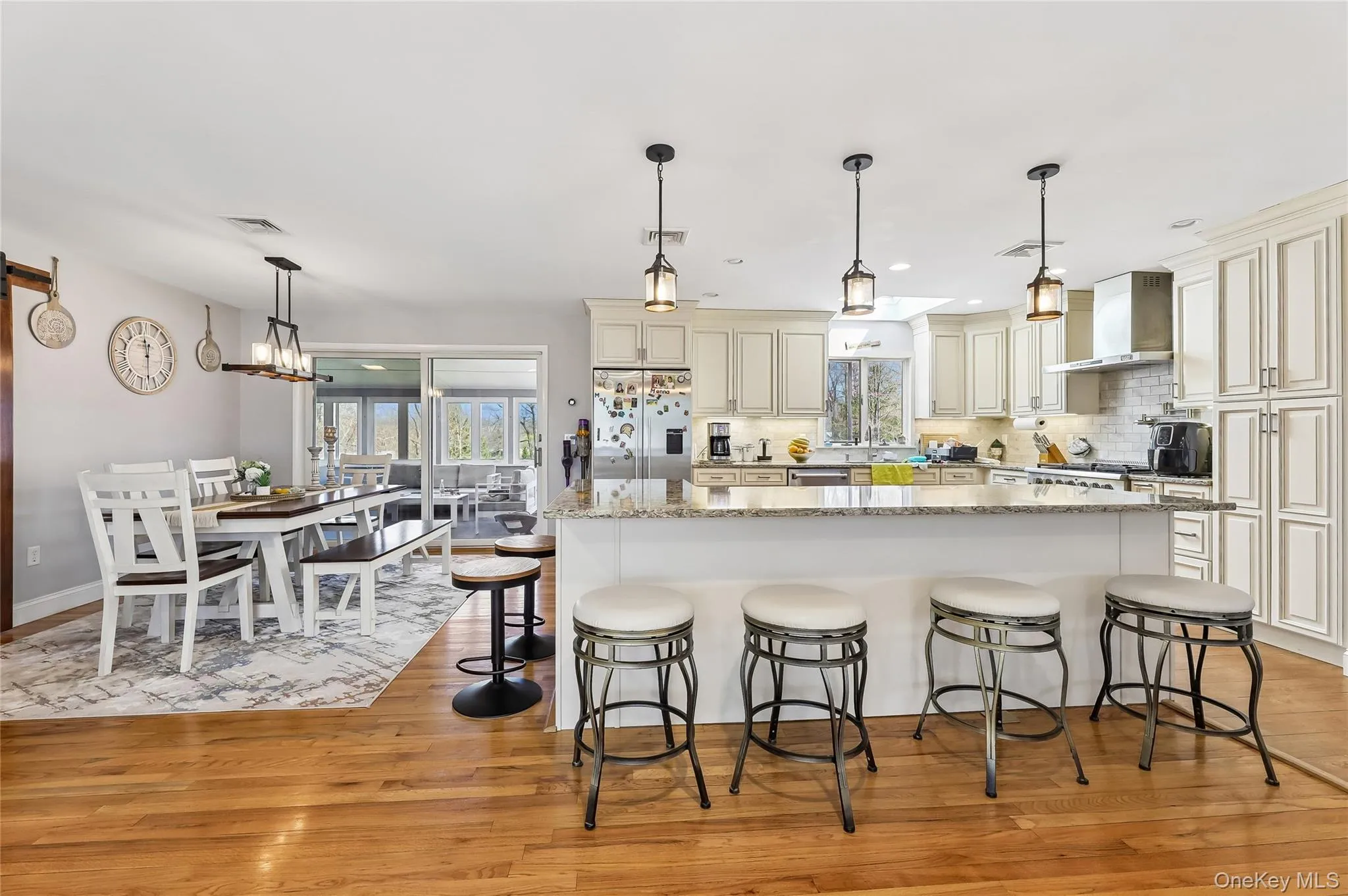 Open-concept kitchen and dining area. Open-concept kitchen and dining area.