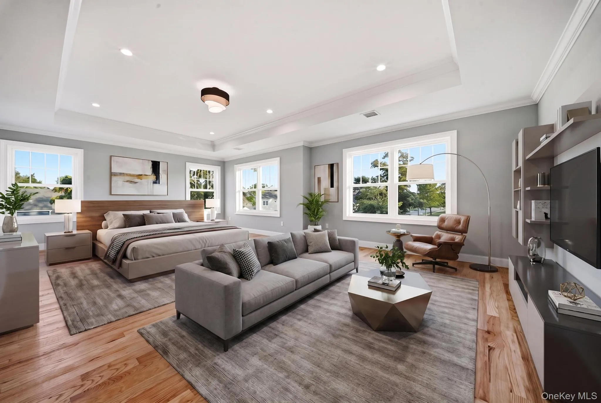 Staged - Primary Bedroom with Sitting Area - 2nd Floor Staged - Primary Bedroom with Sitting Area - 2nd Floor