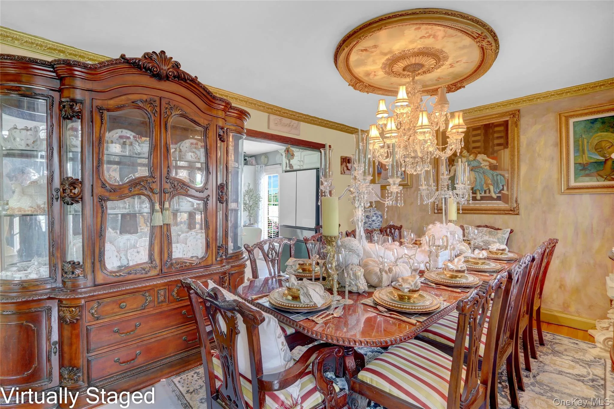 Dining area with suspended lighting and wallpapered walls Dining area with suspended lighting and wallpapered walls