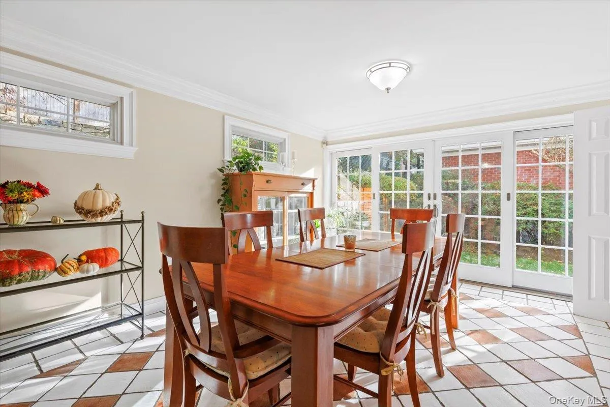 The kitchen opens to another full sized, casual dining area. The kitchen opens to another full sized, casual dining area.