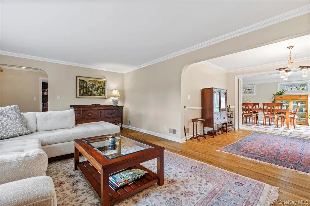 Living room is open to the formal dining room. Living room is open to the formal dining room.