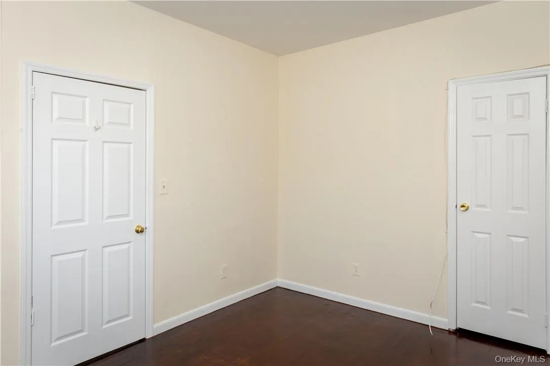 View of front bedroom, closet and door to entry hallway. View of front bedroom, closet and door to entry hallway.
