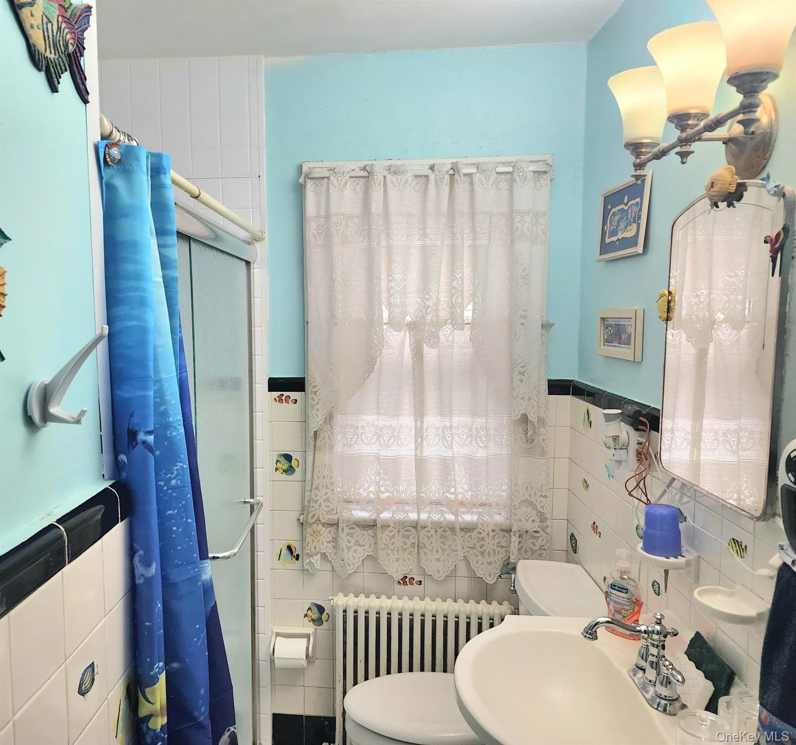 Main Floor Bathroom with Glass shower door Main Floor Bathroom with Glass shower door
