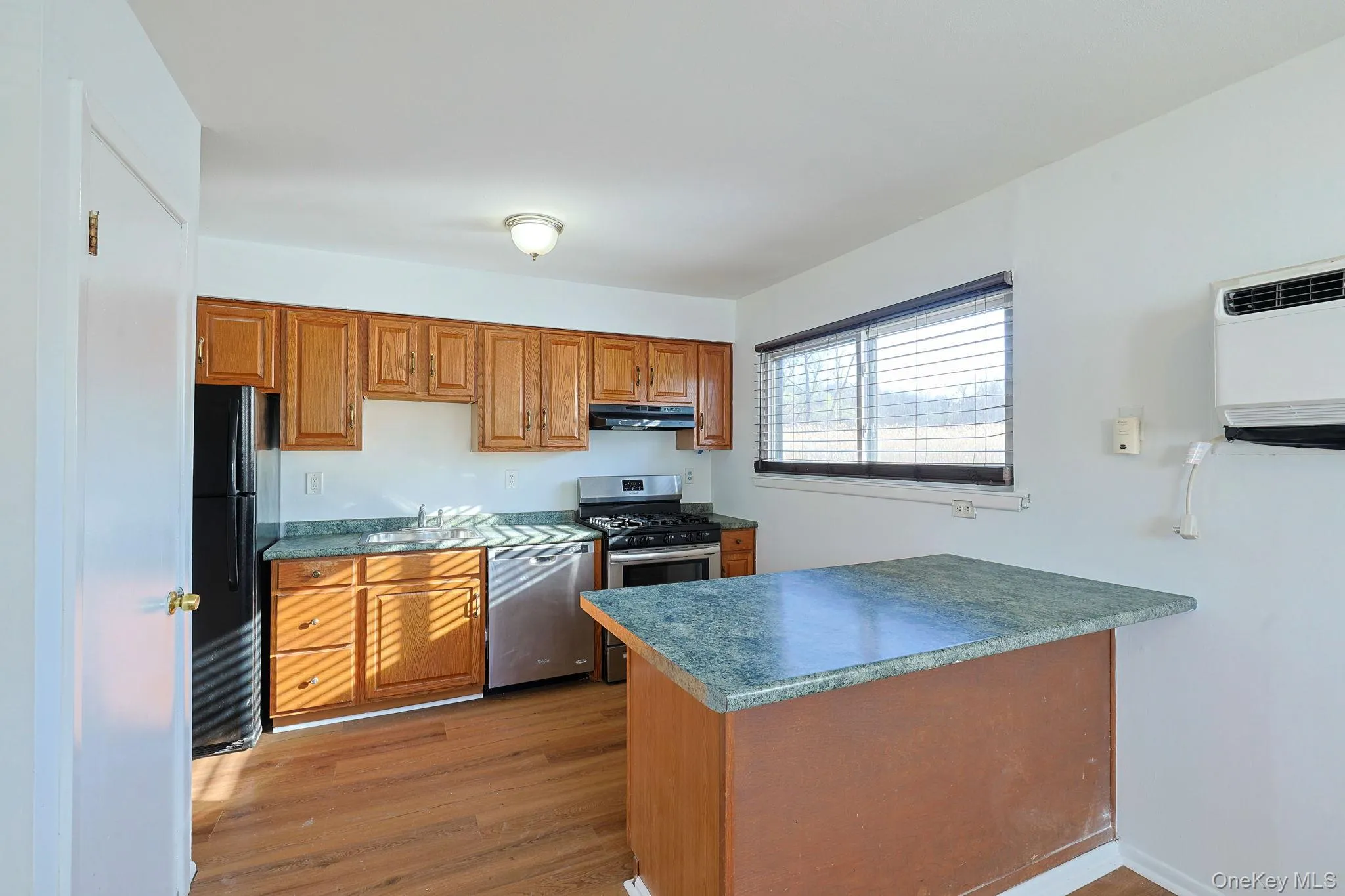 Kitchen with wood finish cabinets Kitchen with wood finish cabinets