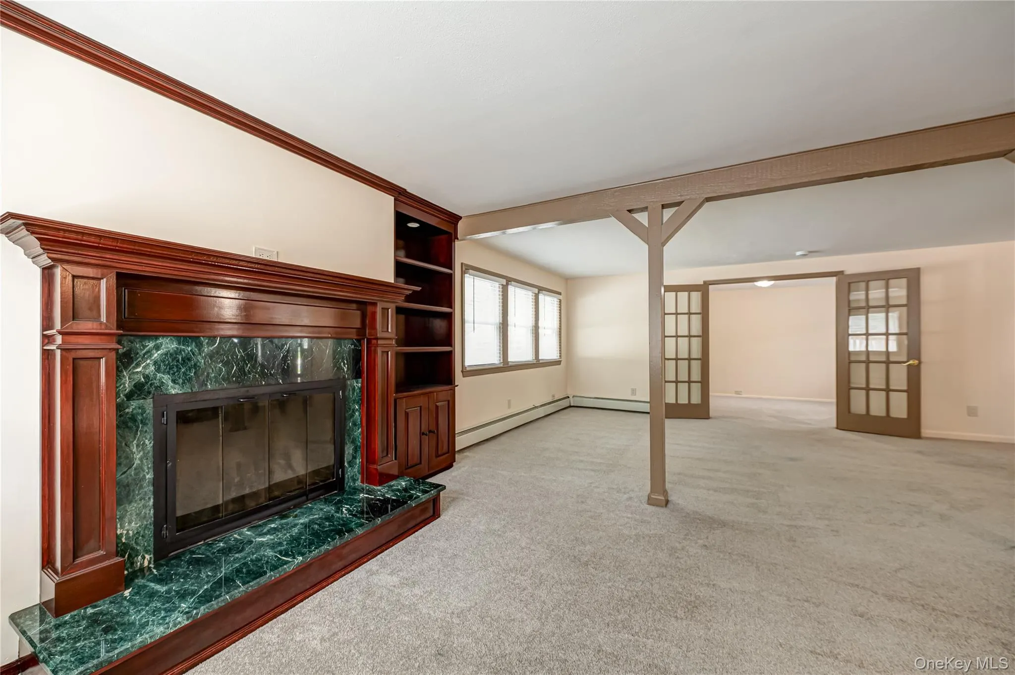 Fireplace with a green stone surround and hearth Fireplace with a green stone surround and hearth