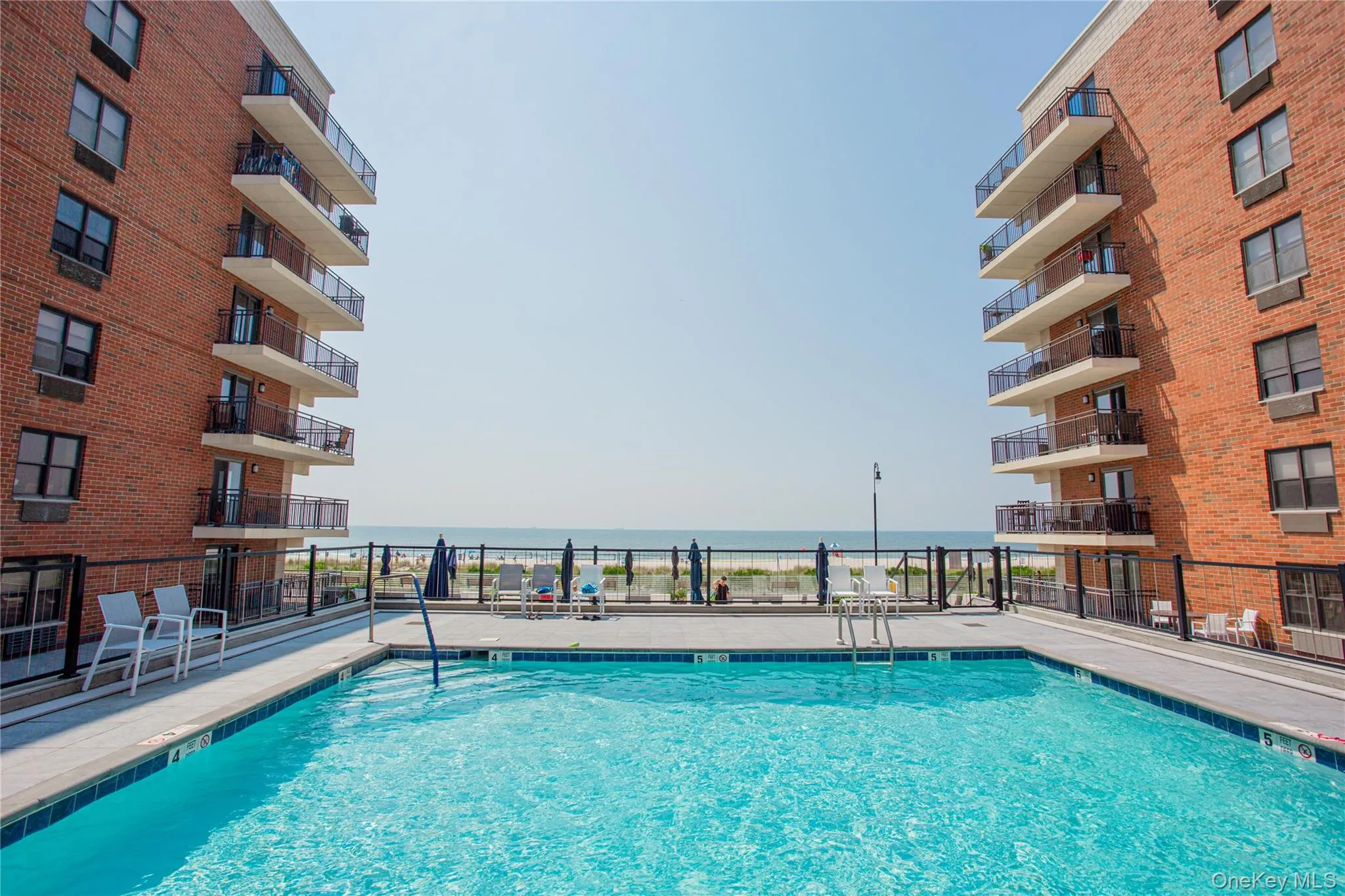 Community pool with a water view Community pool with a water view