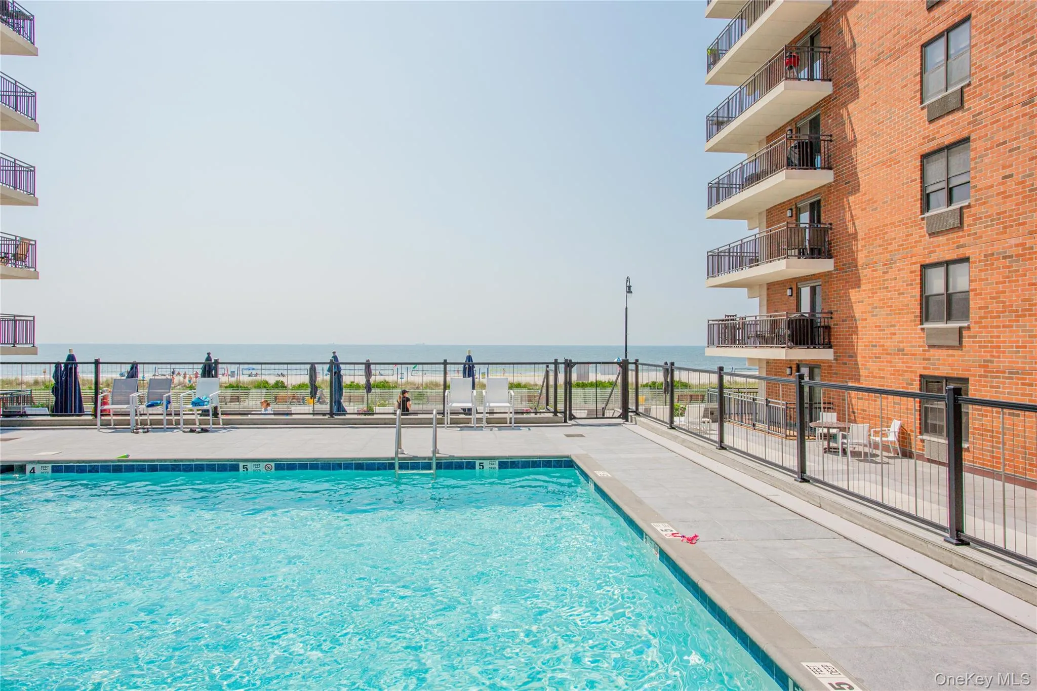 Community pool with a water view Community pool with a water view