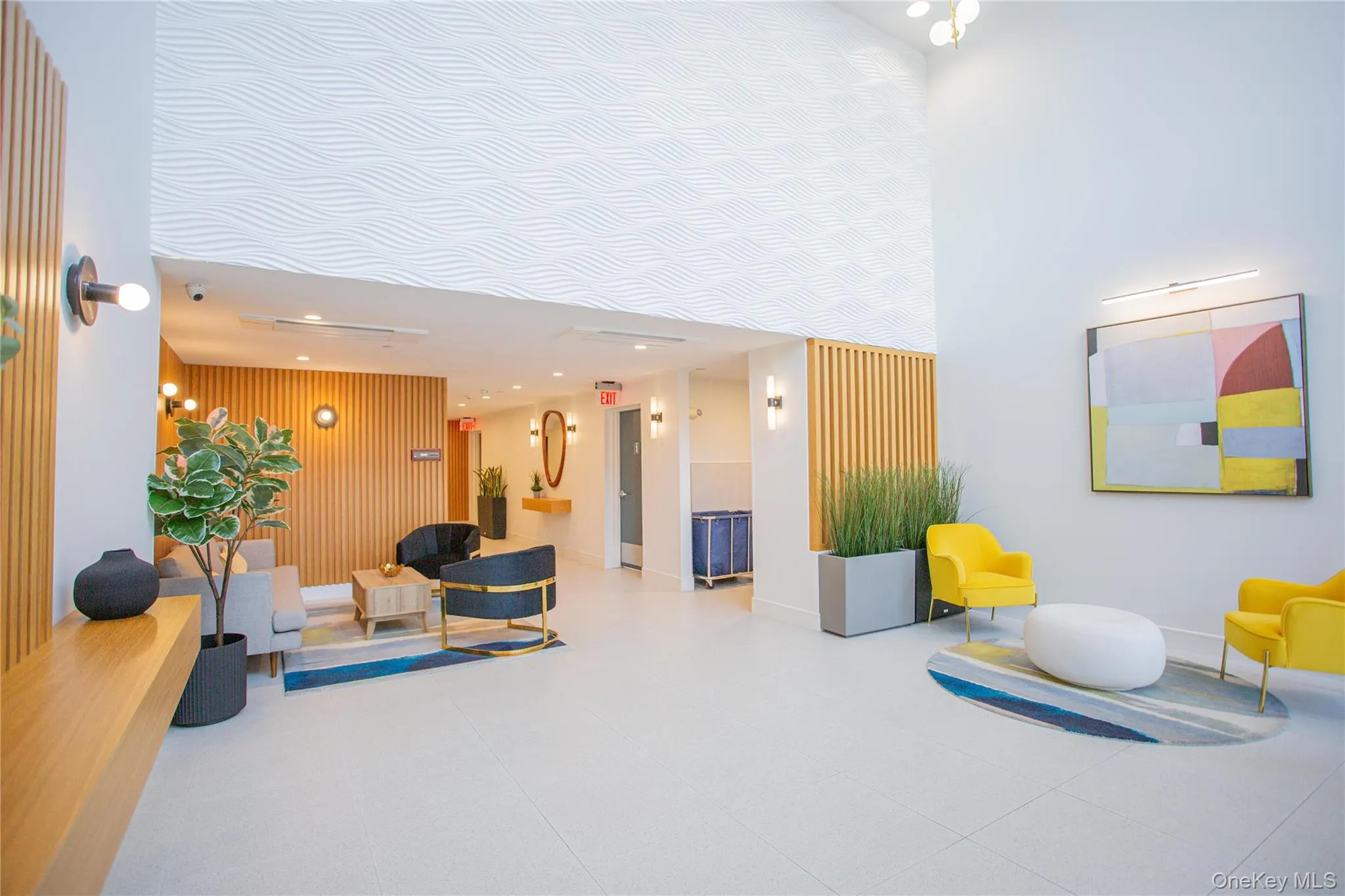 Lobby with a towering ceiling and recessed lighting Lobby with a towering ceiling and recessed lighting