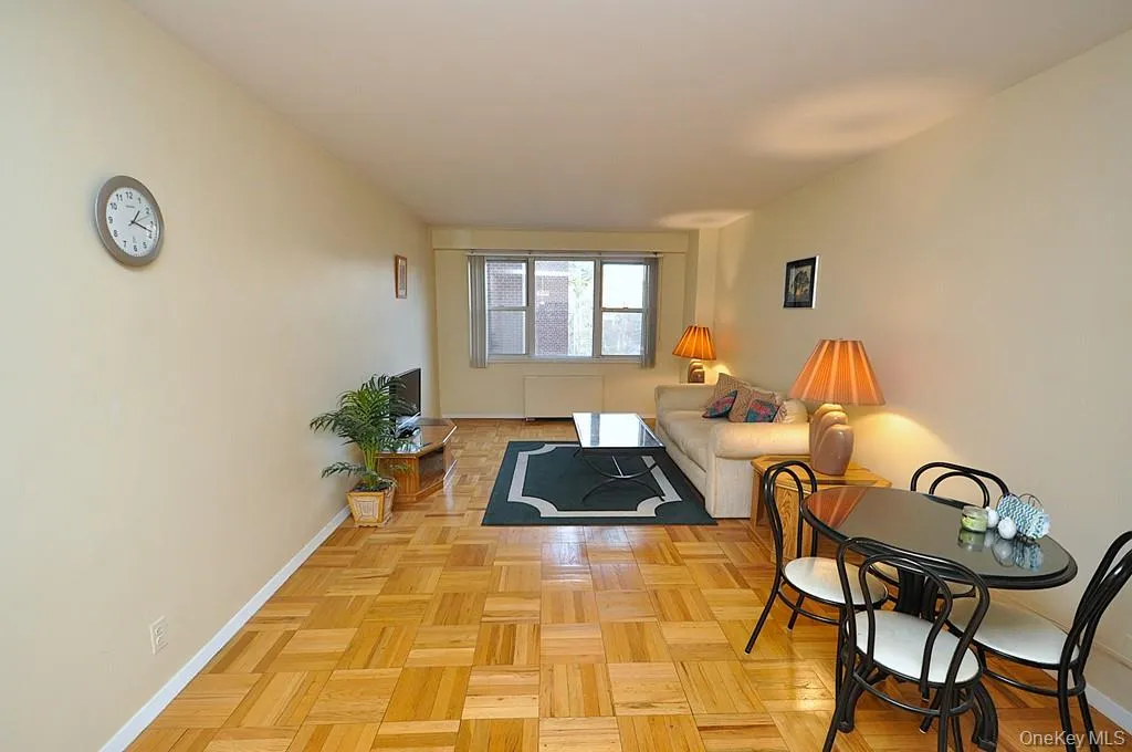 Living room and dining area have Eastern Views and parquet floors. The room is approx. 18'-9" x 11'-3" Living room and dining area have Eastern Views and parquet floors. The room is approx. 18'-9" x 11'-3"