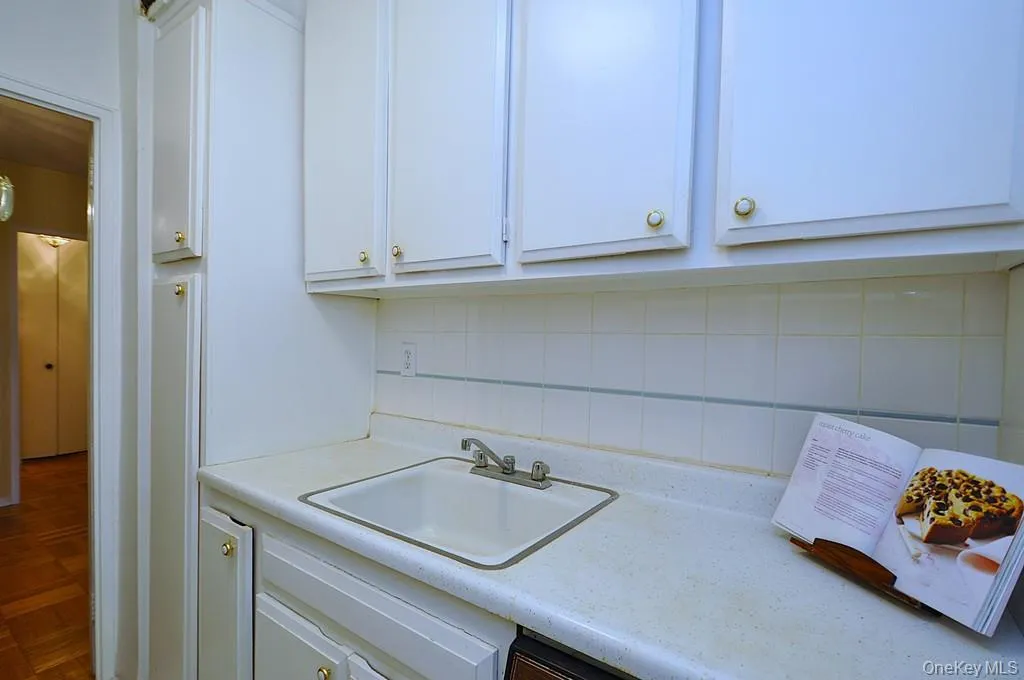 Kitchen has a refrigerator, stove top and wall oven. Kitchen has a refrigerator, stove top and wall oven.