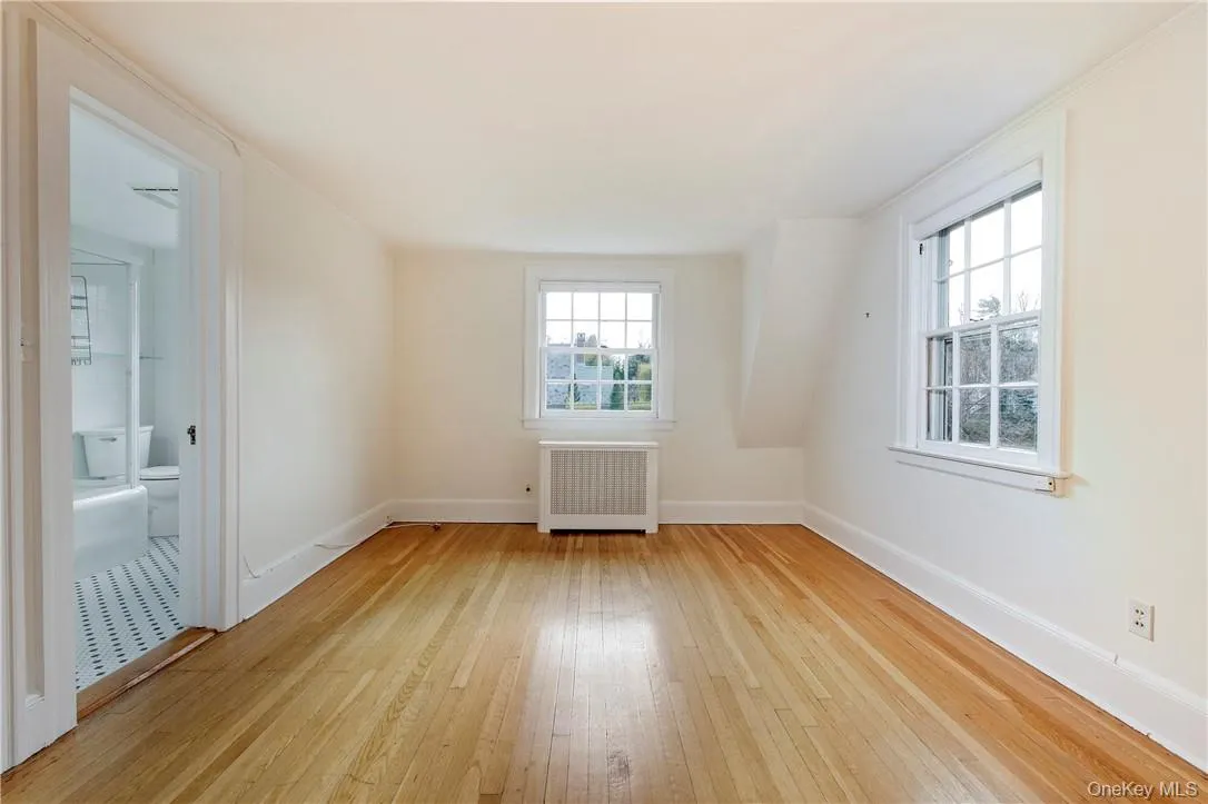 Primary BR runs front to back of the house with ensuite Bath. Windows on three sides, lots of light ! Primary BR runs front to back of the house with ensuite Bath. Windows on three sides, lots of light !