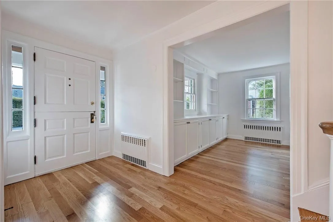 Spacious Front Hall Entry exudes charm with unique Dutch Door. Spacious Front Hall Entry exudes charm with unique Dutch Door.