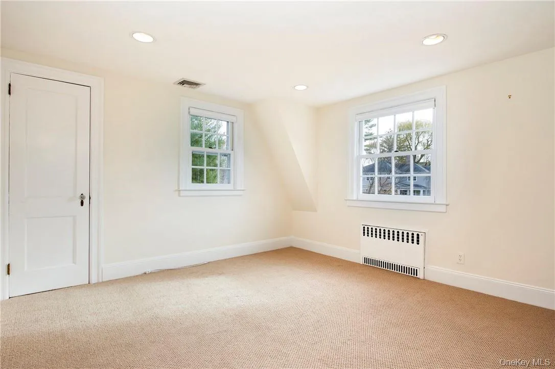 2nd Bedroom with large window overlooks beautiful front lawn. 2nd Bedroom with large window overlooks beautiful front lawn.