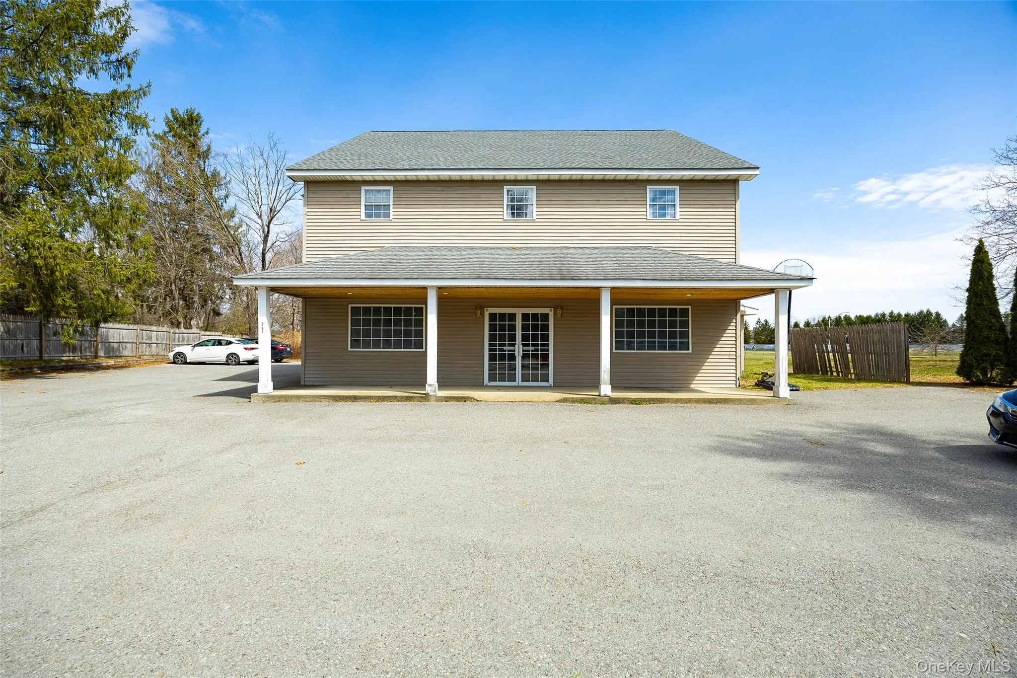 Front with parking lot. Front with parking lot.